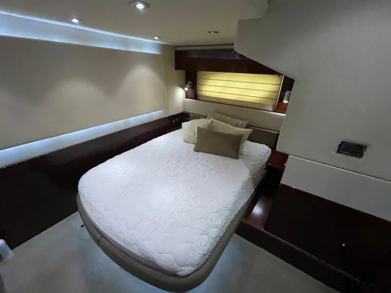 Slide: The Image of Luxurious bedroom interior of 2010 Sea Ray 540 Sundancer yacht with modern design. - 28