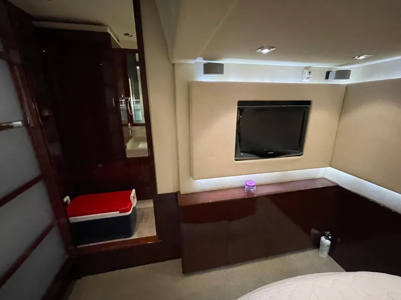 Slide: The Image of Interior of 2010 Sea Ray 540 Sundancer yacht with TV and modern furnishings. - 29