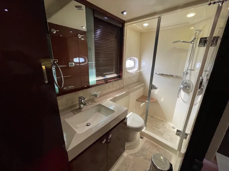 Slide: The Image of Luxurious bathroom in 2010 Sea Ray 540 Sundancer yacht with modern fixtures and shower. - 30