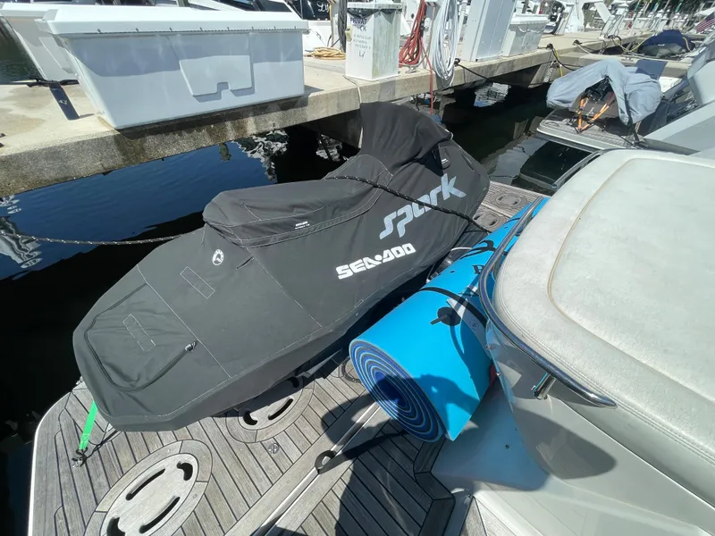 Slide: The Image of Covered Sea-Doo Spark on a 2010 Sea Ray 540 Sundancer yacht deck. - 36
