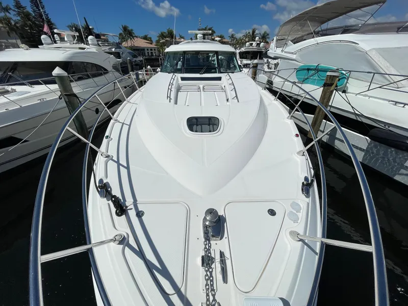 Slide: The Image of 2010 Sea Ray 540 Sundancer yacht docked at marina, sunny day. - 7
