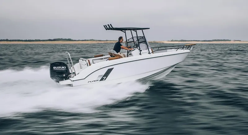 The Image of 2025 Beneteau Flyer 7 SPACEdeck speeding on open water, showcasing sleek design and performance. - 1