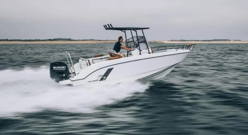 Slide: The Image of 2025 Beneteau Flyer 7 SPACEdeck speeding on open water, showcasing sleek design and performance. - 5
