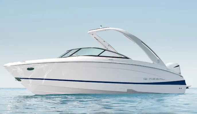 The Image of 2026 Regal LX4 boat on trailer, parked on grass under blue sky. - 0