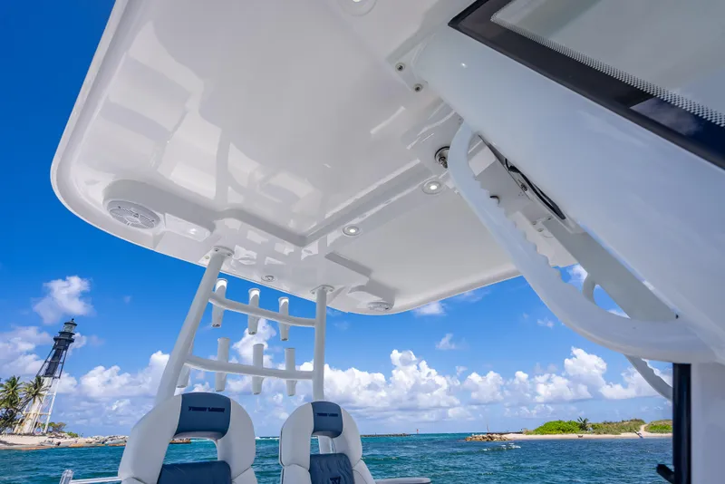 Slide: The Image of 2026 Twin Vee 260 GFX2 CC boat interior with ocean and lighthouse view. - 41