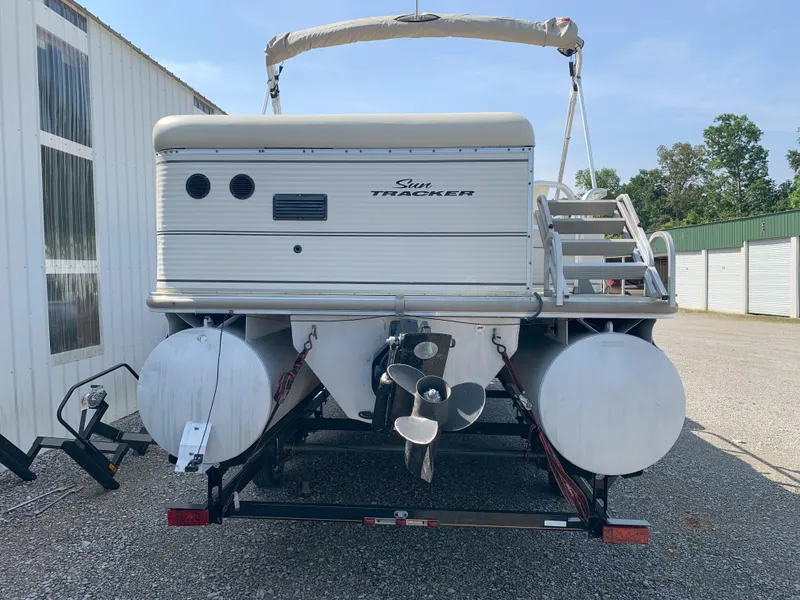 Slide: The Image of 2007 Sun Tracker Party Barge 22 pontoon boat on trailer, rear view. - 3