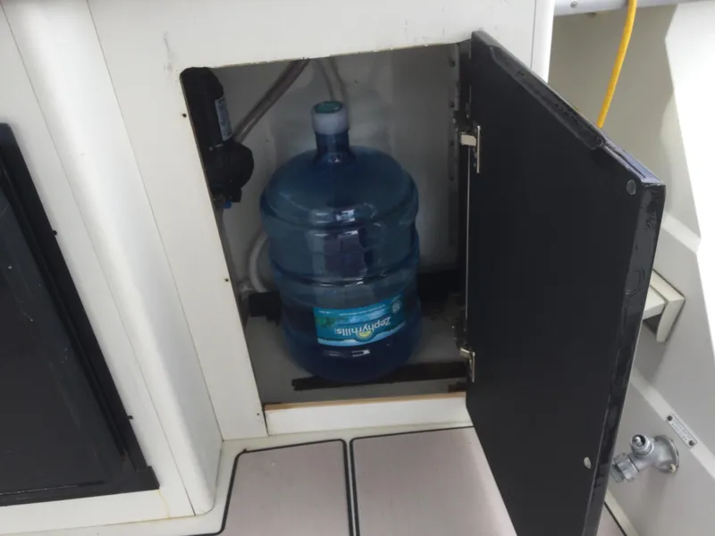 Slide: The Image of Water storage compartment on 1995 Carver 430 Cockpit Motor Yacht. - 23