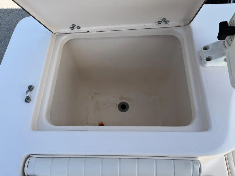 Slide: The Image of Open storage compartment on 1997 Grady-White 232 Gulfstream boat. - 38