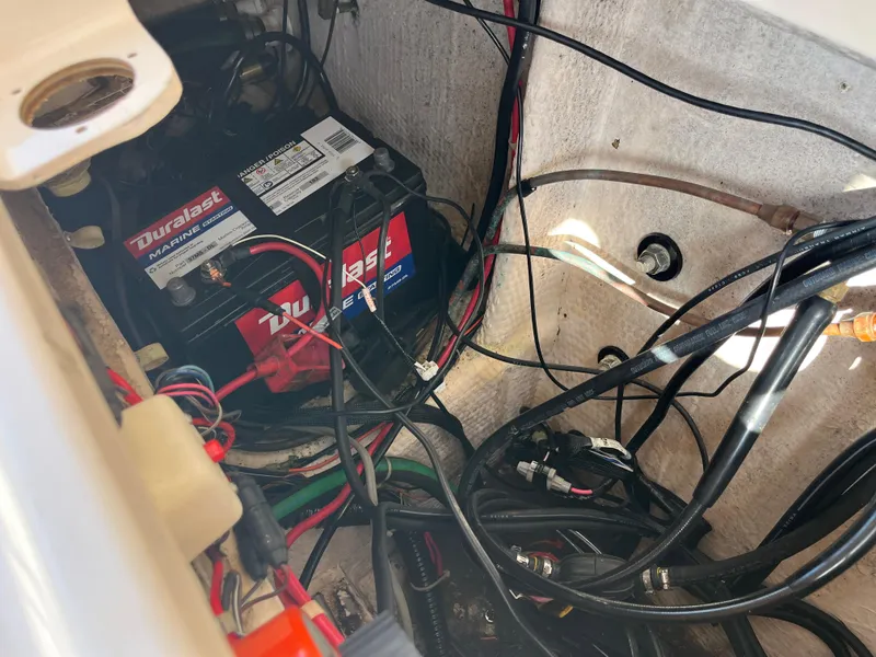 Slide: The Image of Battery compartment of 1997 Grady-White 232 Gulfstream boat with Duralast marine battery. - 40