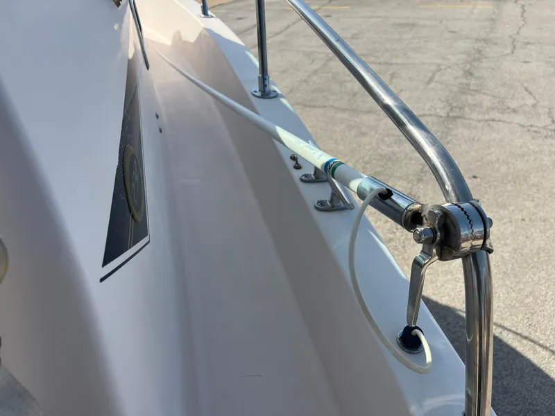 Slide: The Image of Close-up of 1997 Grady-White 232 Gulfstream boat railing and deck details. - 47