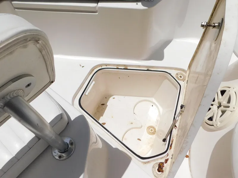 Slide: The Image of Open storage compartment on a 2015 Sea Fox 286 Commander boat. - 17