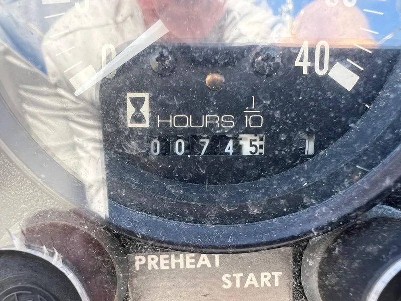 Slide: The Image of Close-up of a 1976 Endeavour 32' Sloop engine hour meter reading 745. - 20