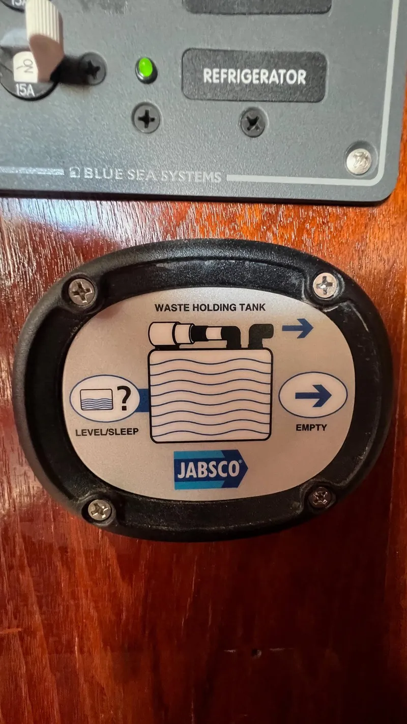 Slide: The Image of Jabsco waste holding tank gauge on 1976 Endeavour 32' Sloop sailboat. - 28