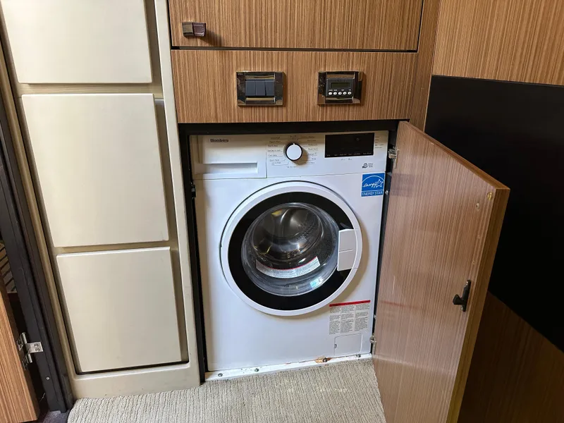 Slide: The Image of Built-in washing machine on 2016 Sea Ray L590 yacht, Energy Star certified. - 10