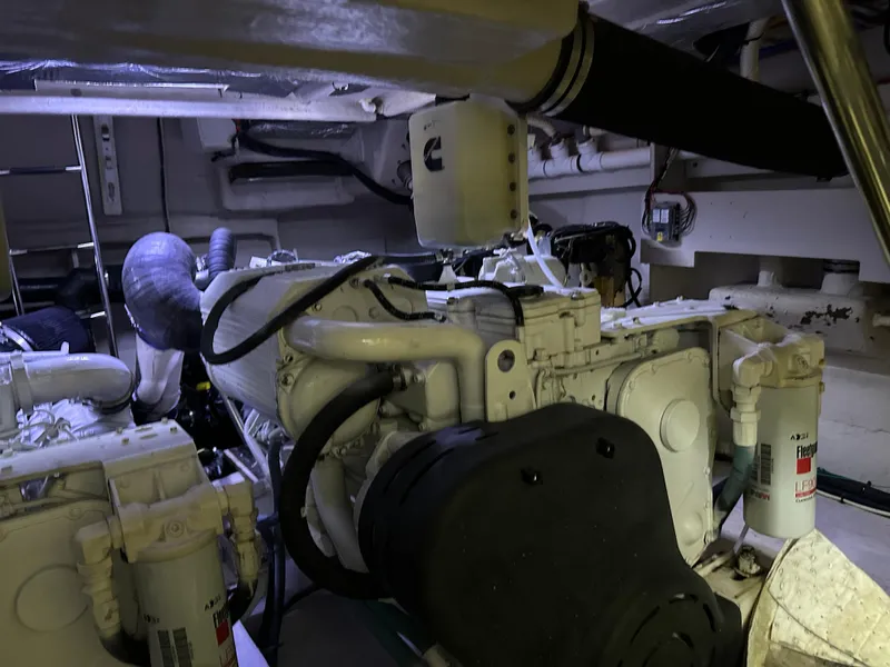 Slide: The Image of Engine room of 2016 Sea Ray L590 yacht, showcasing mechanical components and systems. - 22