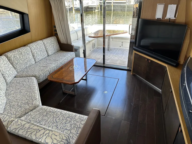 Slide: The Image of Luxurious interior of 2016 Sea Ray L590 yacht with elegant seating and modern amenities. - 32