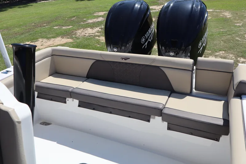 Slide: The Image of 2022 Tidewater 272 LXF boat with Yamaha engines and comfortable seating. - 11