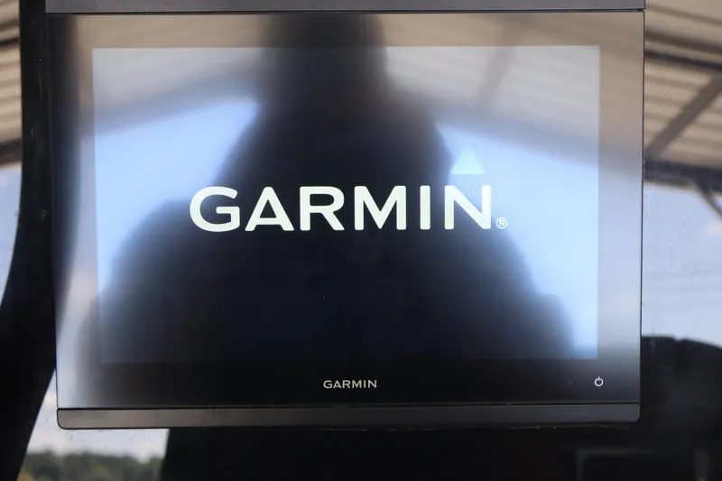 Slide: The Image of Garmin display screen on 2022 Tidewater 272 LXF boat dashboard. - 17