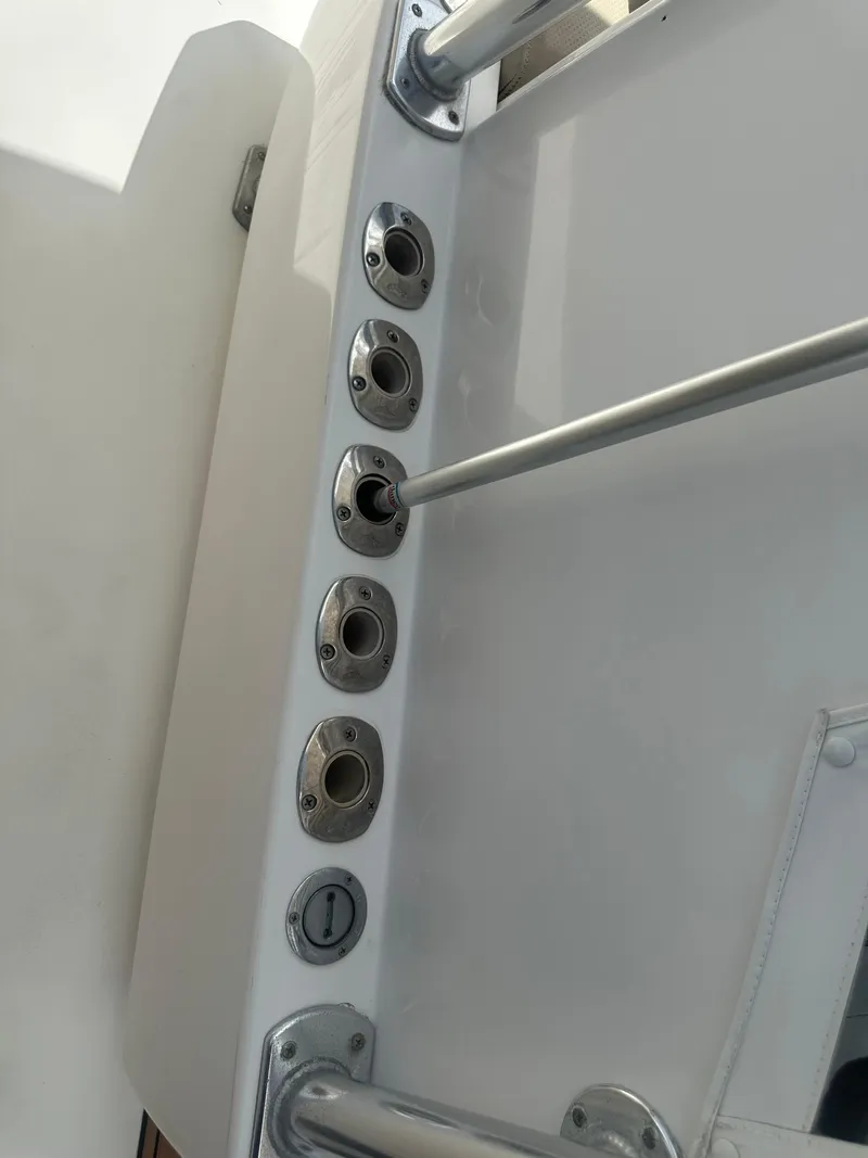 Slide: The Image of Rod holders on a 2008 Contender 36 Open boat. - 35