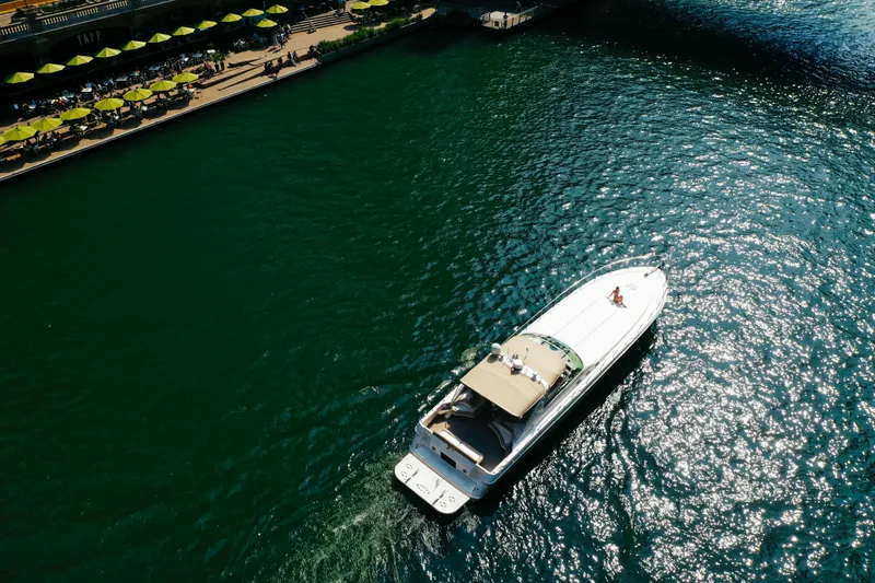 Slide: The Image of Aerial view of 1997 Sea Ray 630 Super Sun Sport yacht cruising on a sunny day. - 24