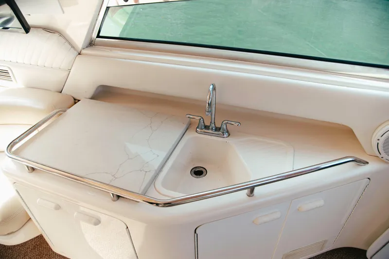 Slide: The Image of 1997 Sea Ray 630 Super Sun Sport yacht interior with marble countertop and sink. - 34