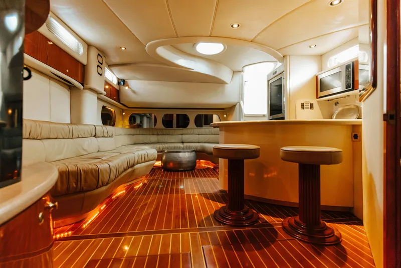 Slide: The Image of Luxurious interior of 1997 Sea Ray 630 Super Sun Sport yacht with elegant seating and modern amenities. - 47