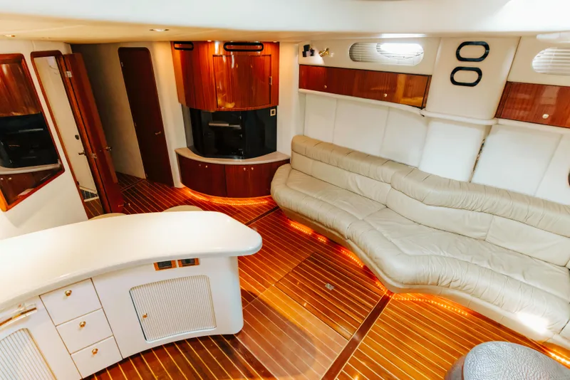 Slide: The Image of Luxurious interior of 1997 Sea Ray 630 Super Sun Sport yacht with elegant wood finishes. - 48