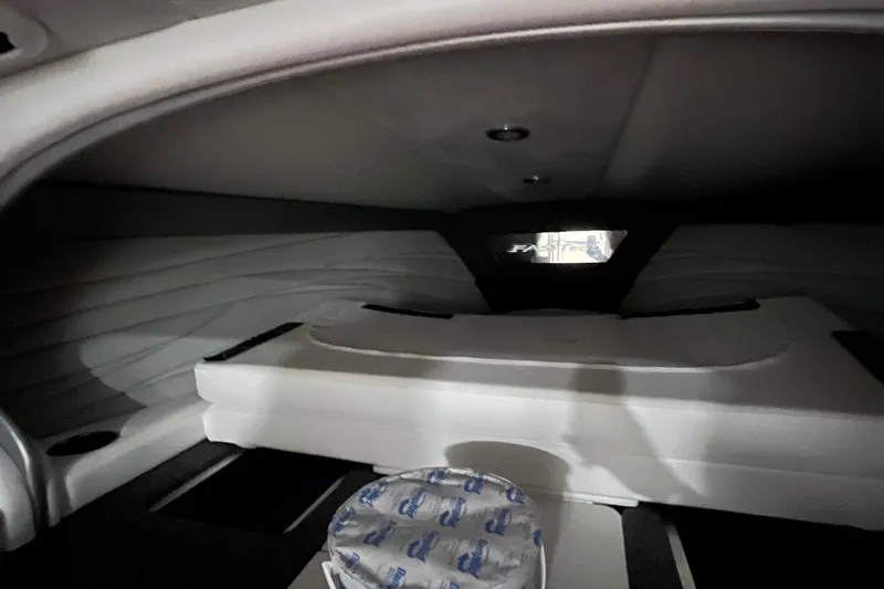 Slide: The Image of Interior cabin of 2017 Formula 292 FASTech boat, featuring cushioned seating and sleek design. - 6