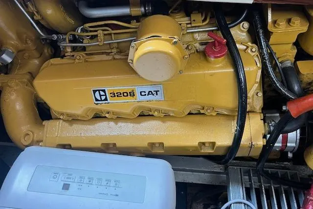 Slide: The Image of Caterpillar 3208 engine in a 1981 Viking 35 Convertible boat. - 30