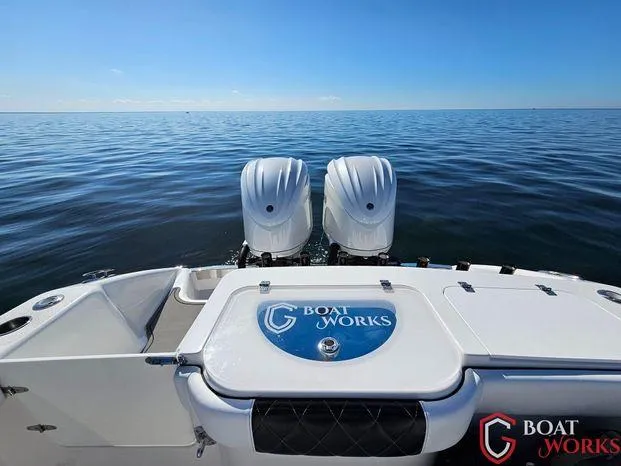 Slide: The Image of 2022 CG Boat Works 35 M-Series on calm ocean with dual engines. - 7