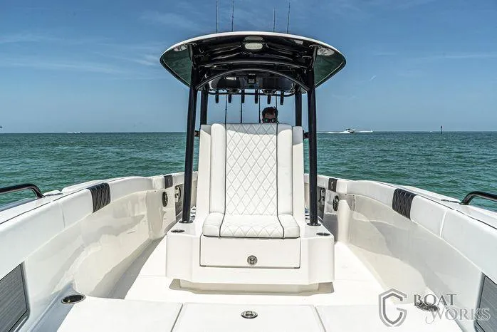 Slide: The Image of 2022 CG Boat Works 35 M-Series on open water, featuring sleek design and luxurious seating. - 9