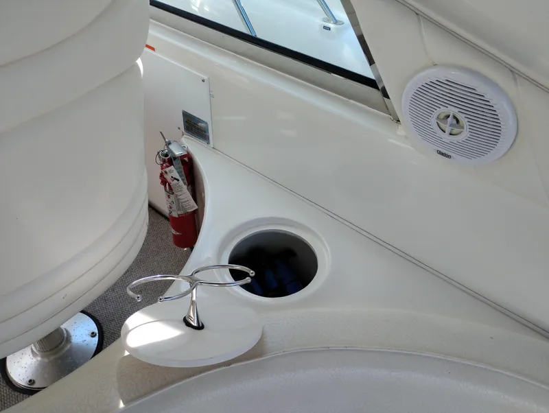Slide: The Image of Interior of 1999 Sea Ray 400 Sundancer with fire extinguisher and speaker. - 11