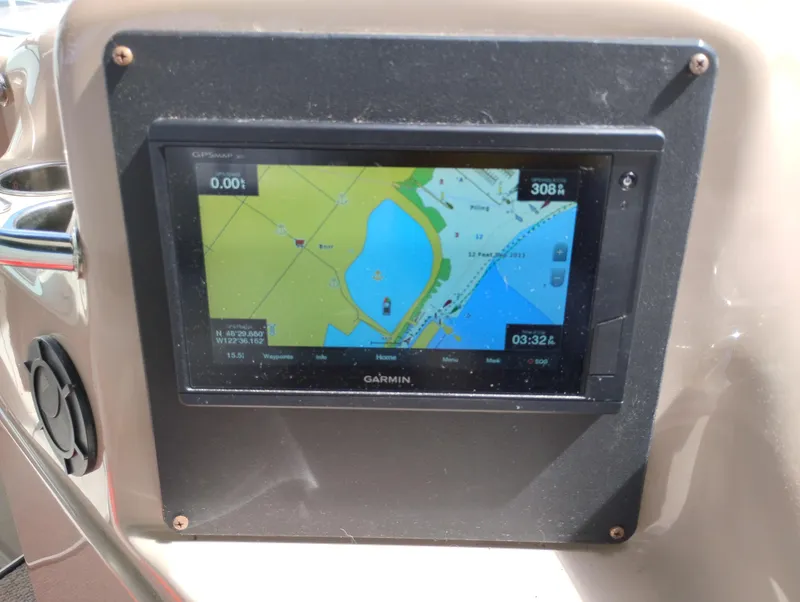 Slide: The Image of Garmin GPS display on 1999 Sea Ray 400 Sundancer boat dashboard. - 17