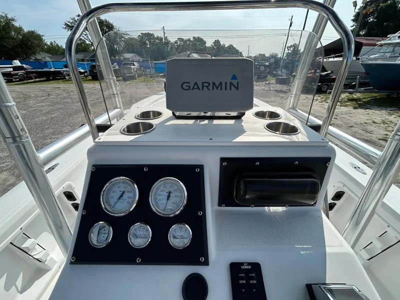Slide: The Image of Kenner Vision 2103 boat dashboard with Garmin GPS, gauges, and cup holders, 2008 model. - 11