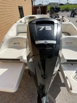Slide: The Image of 2017 Bayliner Element E16 boat with 75 HP engine, rear view. - 2