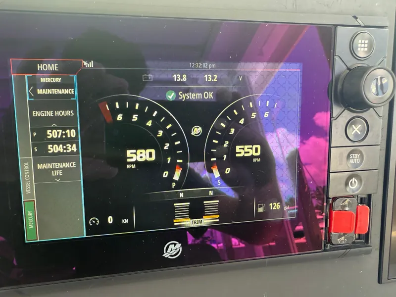 Slide: The Image of Dashboard of a 2017 Axopar 37 Sun Top showing engine RPM and maintenance data. - 30