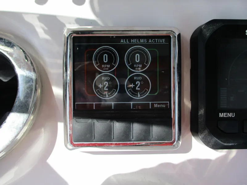 Slide: The Image of Digital display panel on 2024 Blue Wave 2800 Makaira boat showing RPM and rudder angle. - 10