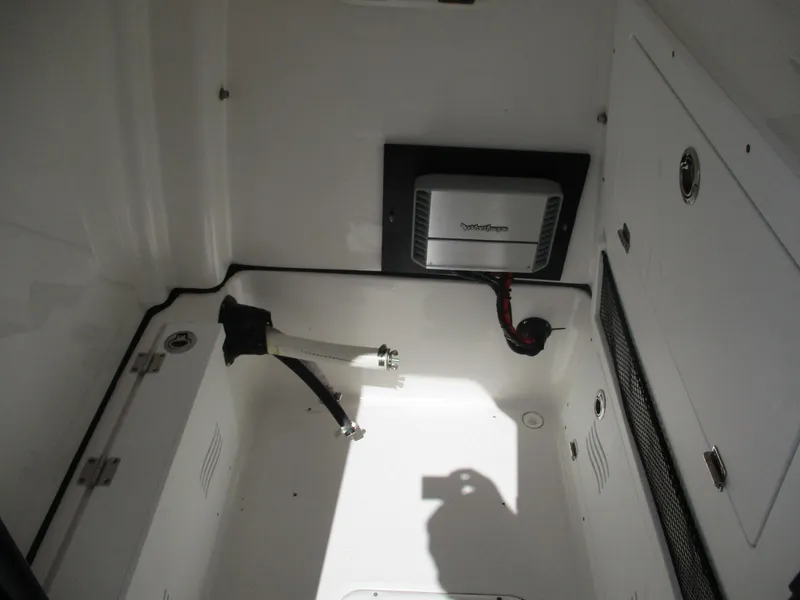Slide: The Image of Interior view of 2024 Blue Wave 2800 Makaira boat compartment with installed equipment. - 14