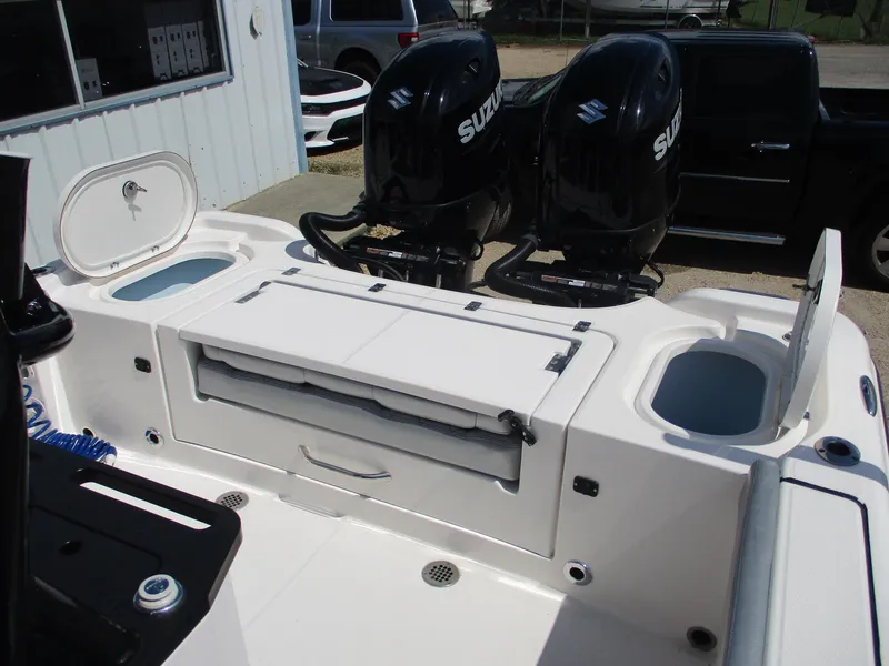 Slide: The Image of 2024 Blue Wave 2800 Makaira boat with dual Suzuki outboard engines. - 17