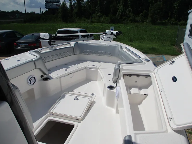 Slide: The Image of 2024 Blue Wave 2800 Makaira boat interior with spacious seating and storage compartments. - 27