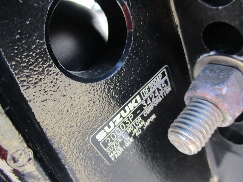 Slide: The Image of Close-up of Suzuki motor label on 2024 Blue Wave 2800 Makaira boat. - 37