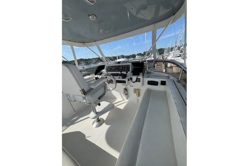 Slide: The Image of Cockpit of 1994 Johnson High Tech Euro 56 yacht with steering wheel and seating. - 24