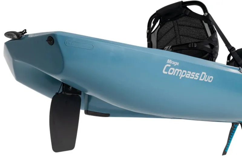 Slide: The Image of 2025 Hobie Mirage Compass Duo kayak, blue, featuring a comfortable seat and rudder system. - 4