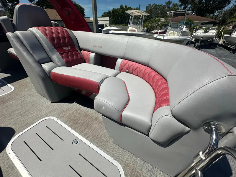 Slide: The Image of Luxurious seating on 2020 Bennington R 24 RTFBA boat with red and gray upholstery. - 36