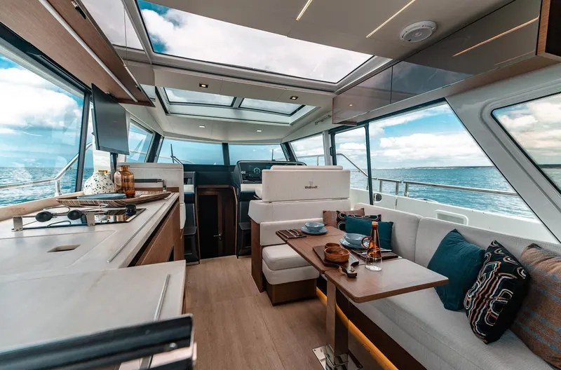 Slide: The Image of Luxurious interior of 2026 Wellcraft 44 Explorer yacht with panoramic ocean views. - 7