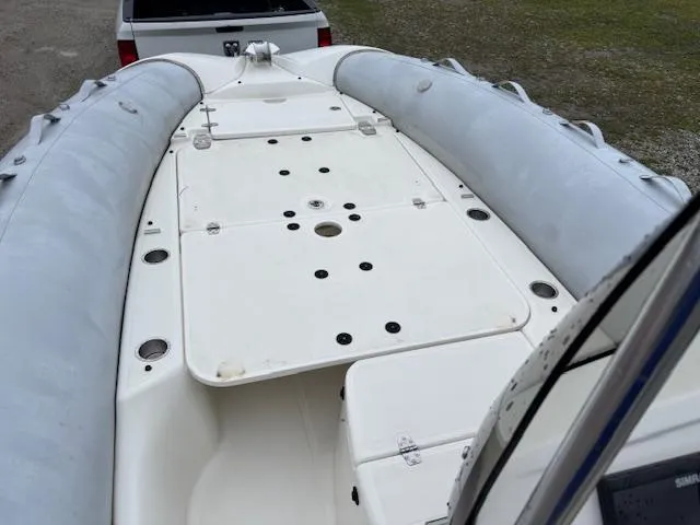 Slide: The Image of 2023 Zodiac NZO-680 inflatable boat on trailer, viewed from above. - 17