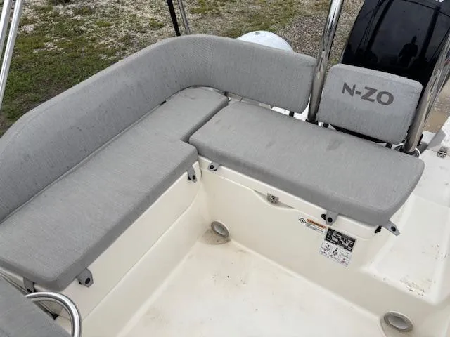 Slide: The Image of 2023 Zodiac NZO-680 boat seating area with gray cushions. - 20