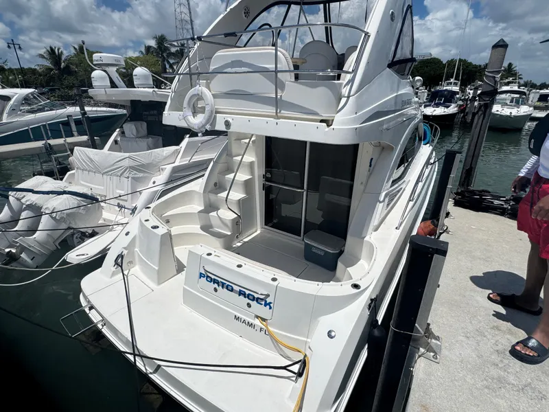 Slide: The Image of 2007 Sea Ray 360 Sedan docked at marina under clear skies. - 10