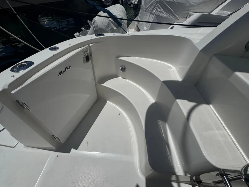Slide: The Image of 2007 Sea Ray 360 Sedan boat interior with seating and storage area. - 17
