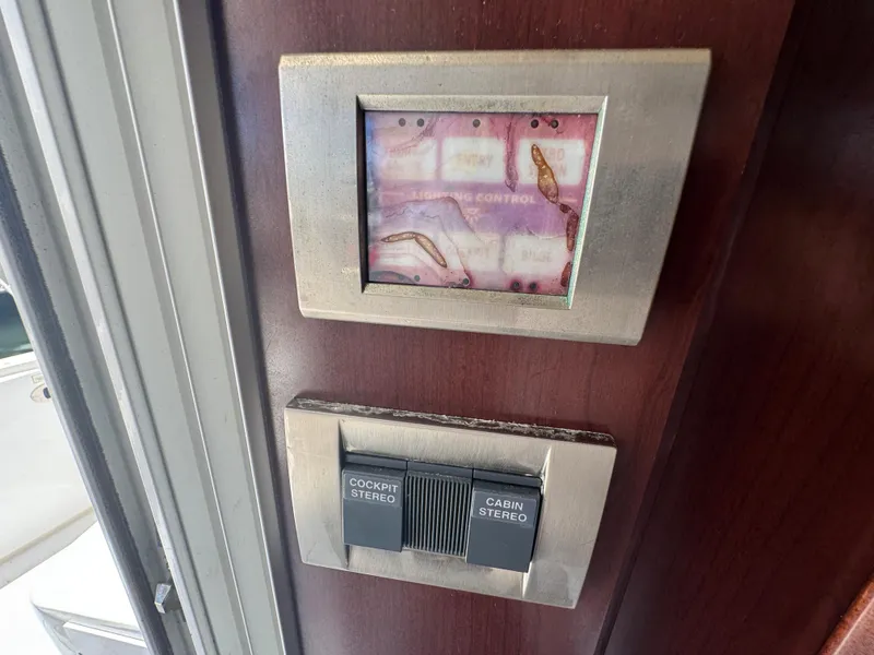 Slide: The Image of Control panel on a 2007 Sea Ray 360 Sedan yacht interior. - 46